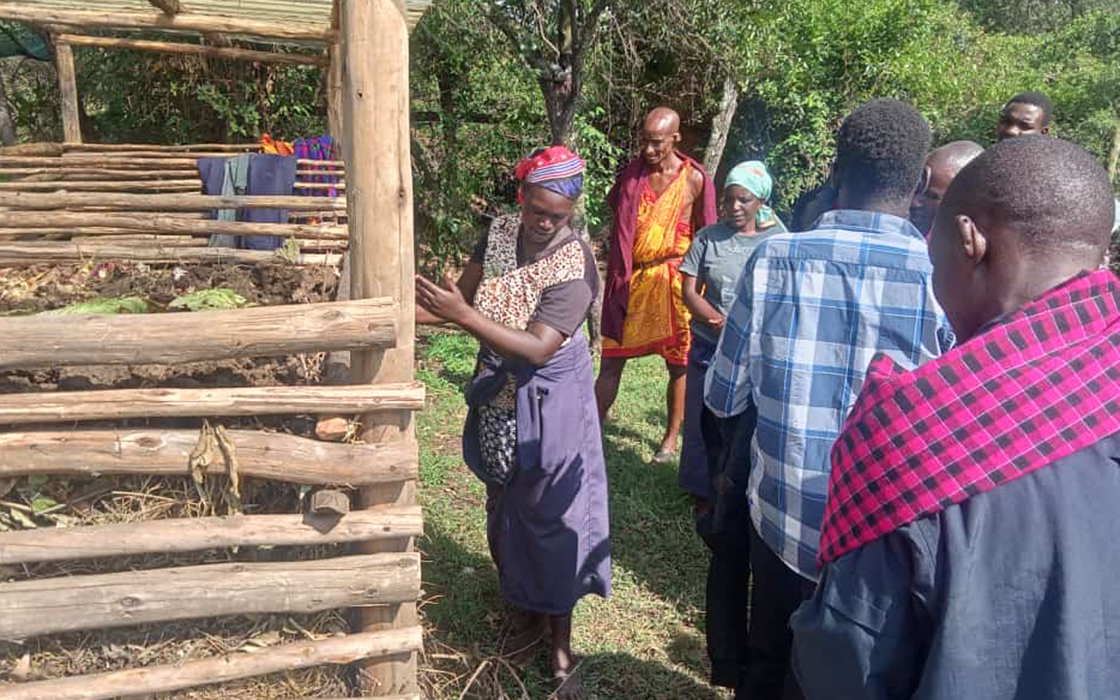 Wild Shamba gardeners Noonkuta and Josephine show members of the Masai community how to do the Indore method of composting that Charlotte helped them set up